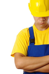 Worker pull hardhat over his eyes