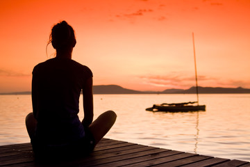 Fototapeta premium Sunset lake and yoga