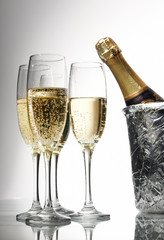 Champagne flutes and ice bucket