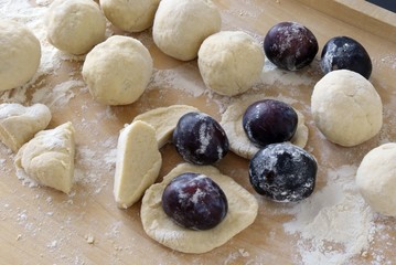 preparing plum dumplings