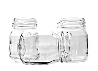 Three glass jars on white