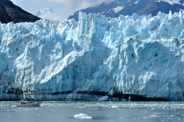 Boat Giving Scale to Massive Tidewater Margerie Glacier, Alaska