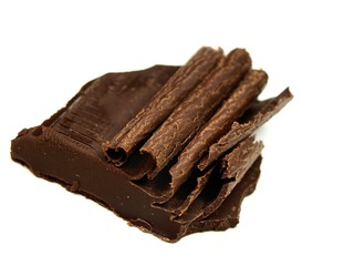 delicious piece of chocolate isolated on white background