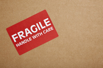 "Fragile" Sticker on brown box