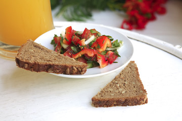 tomato salad and orange juice