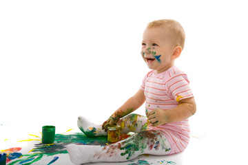 little boy covered with bright paint