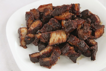 Slices of traditional chinese marinated roast pork