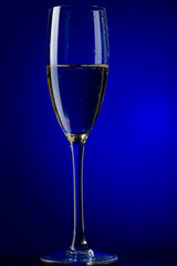 champagne glasses on blue background