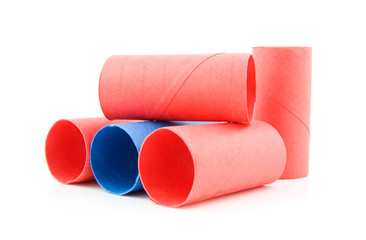 colorful empty toilet paper rolls over white background