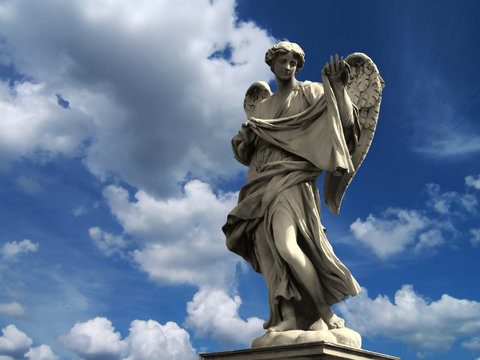 Flying in a blue dream with angel statue