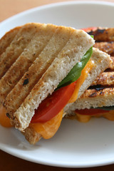 Grilled Cheese Panini with Tomatoes and Basil