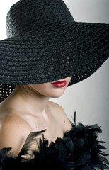 women in black hat and boa - 16410526