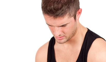 Obraz premium Portrait of anathletic man isolated on a white background