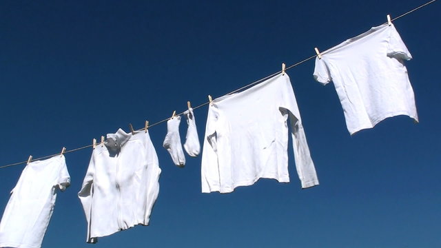 fresh white laundry with blue sky