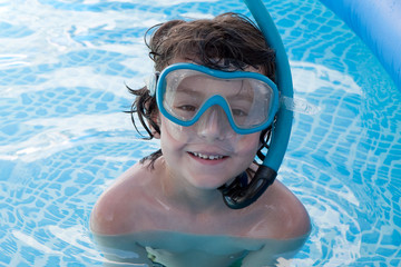 Child in the pool on holiday