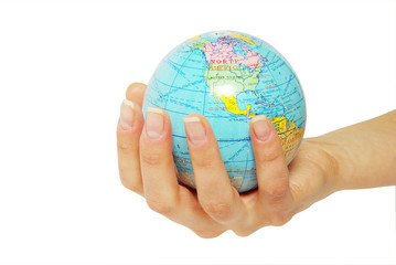 Hand holdings globe