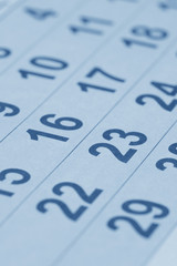Close up of calendar. Blue toned (vertical shot)