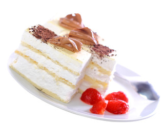 Sponge cakes on plate with strawberry . Isolated