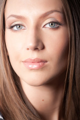 Obraz premium Portrait of attractive brown-haired girl