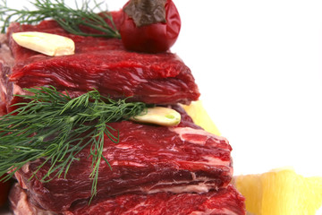 beef rib's on dish with greenery