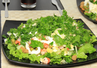 Salad with shrimps,dried crust, green peas and leaf of lettuce