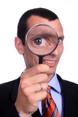 businessman with magnifying glass