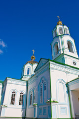 cathedral with cupola on blue sky background
