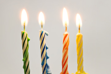 burning birthday candles close up