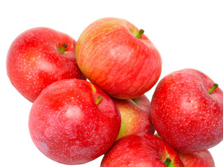 Fragmen of  ripe, red apples. Isolated on white