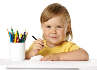 Child draw with crayons and smile