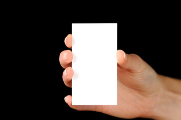 Woman Hand And A Card Isolated On Black Background