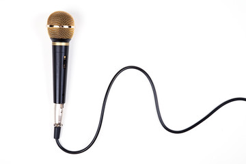 A dynamic microphone on white