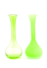 Two green empty vases over white background