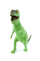 green dinosaur play toy over white background