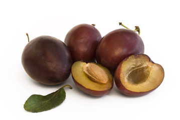 Plum fruit with halves