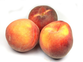 Peaches on white background