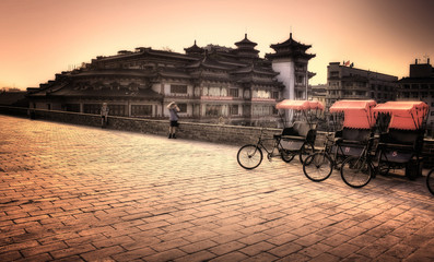 Xi'an / China  - Town wall with bicycles © XtravaganT