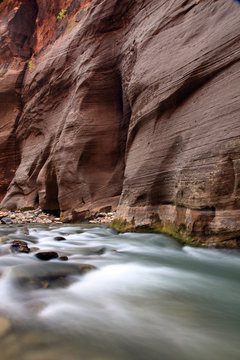 Flowing river water in mountain cliffs