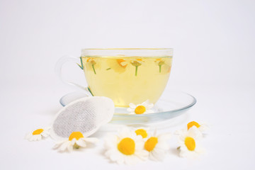 Herbal chamomile tea isolated on white background