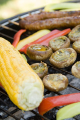 Sausages and vegies on grill