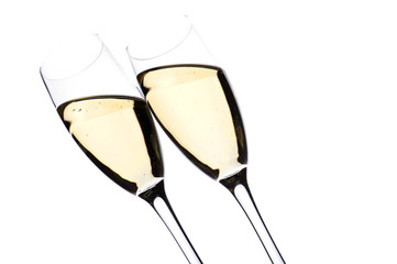Two glasses champagne on white closeup