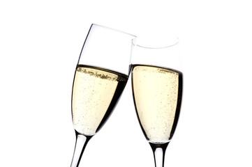 Two glasses champagne on white close up