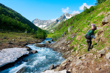 Hiker in Caucasus mountains