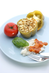 mince filled paprika with tomato on a plate
