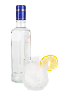Vodka bottel and glass.