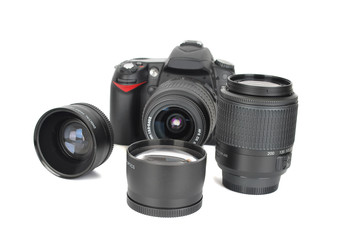 Fototapeta premium Camera and lenses on the white.