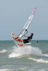 windsurf jumping over wawe 2