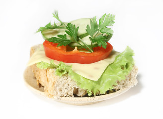 sandwich with cheese, sweet pepper, cucumber and parsley