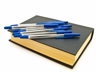 pens at the book