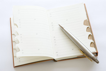 Address book with ballpoint